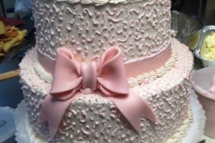 tiered overpiped cake