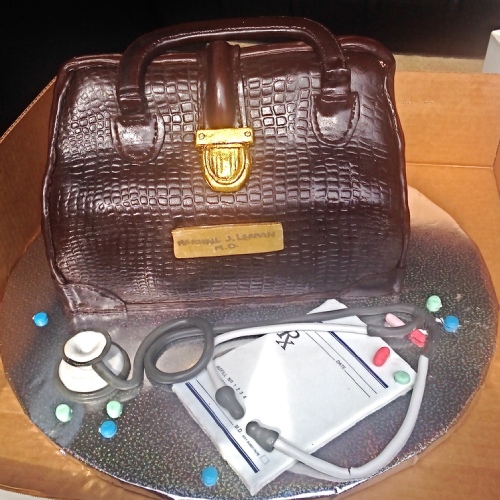 designer handbag sculpture cake