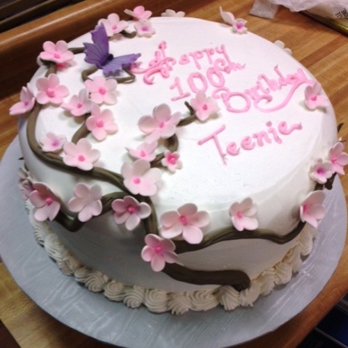 round cake with sakura decoration