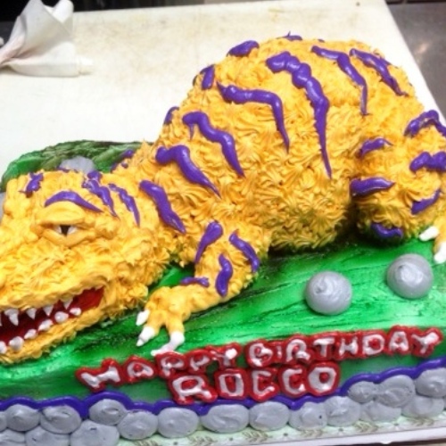dinosaur sculpture cake
